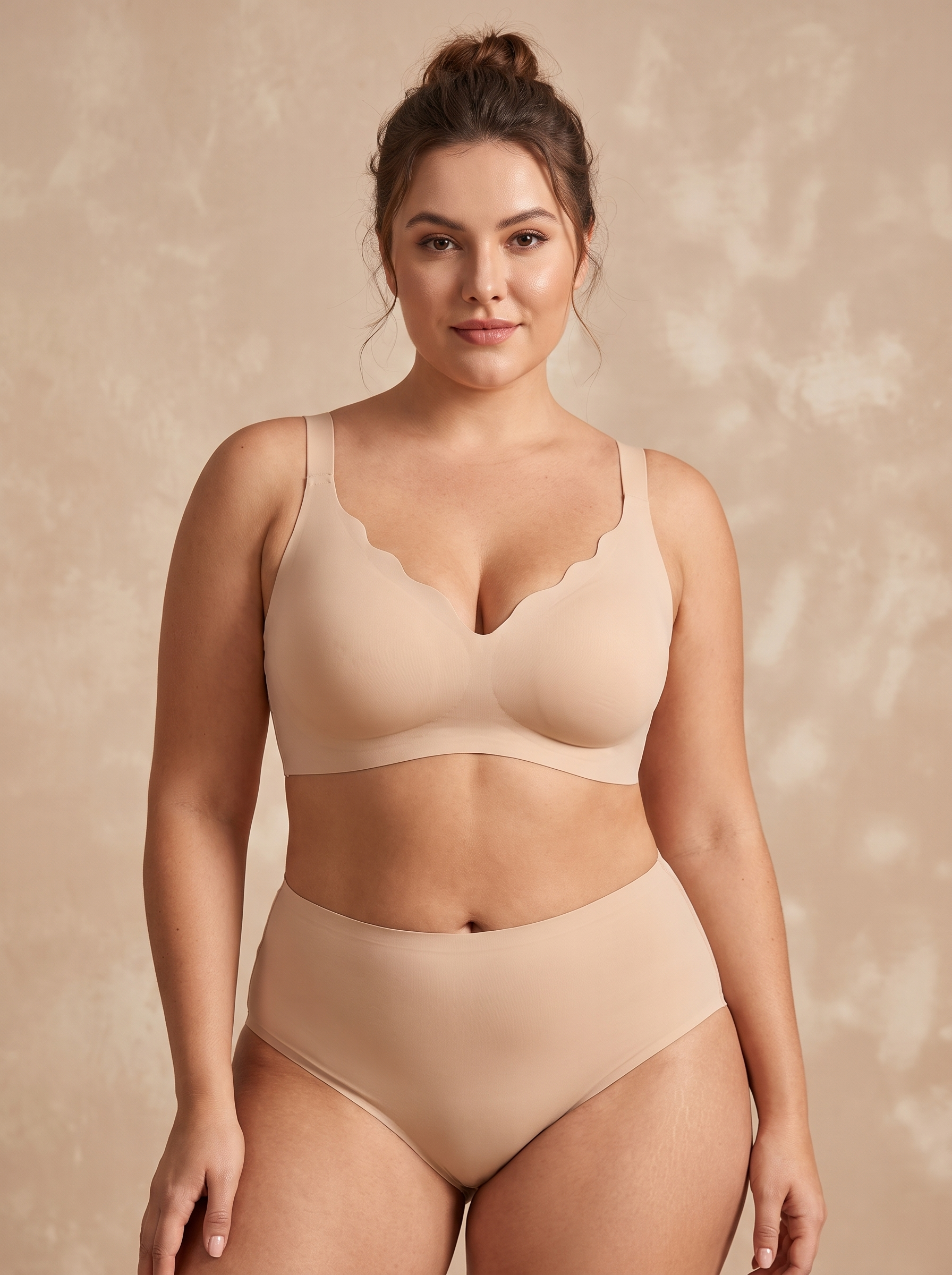 Woman wearing the Sonist Jelly Bra in nude with matching high-waist briefs on a warm textured beige backdrop